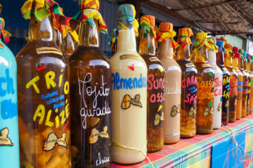 Rhum bottles assortment on market stall