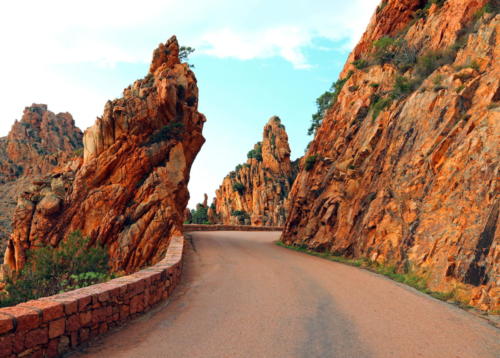 road called D81 in Corsica France and the red rocks called Calanches
